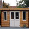 Log cabin with flat roof and double door
