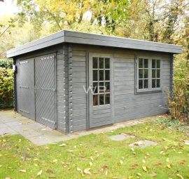 A grey wooden garage for a garden