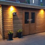 Woodpro log cabin with double door and a flat roof